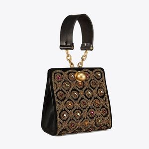 ISO this Tory Burch clutch